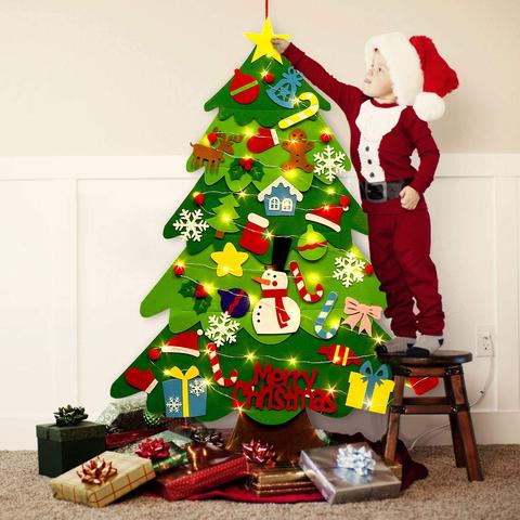 Child decorating CHRISTMASTICK